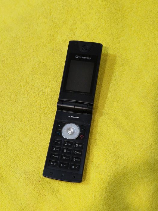 Telefon Sharp Gx29  fara încărcător.  Pret pentru colecție