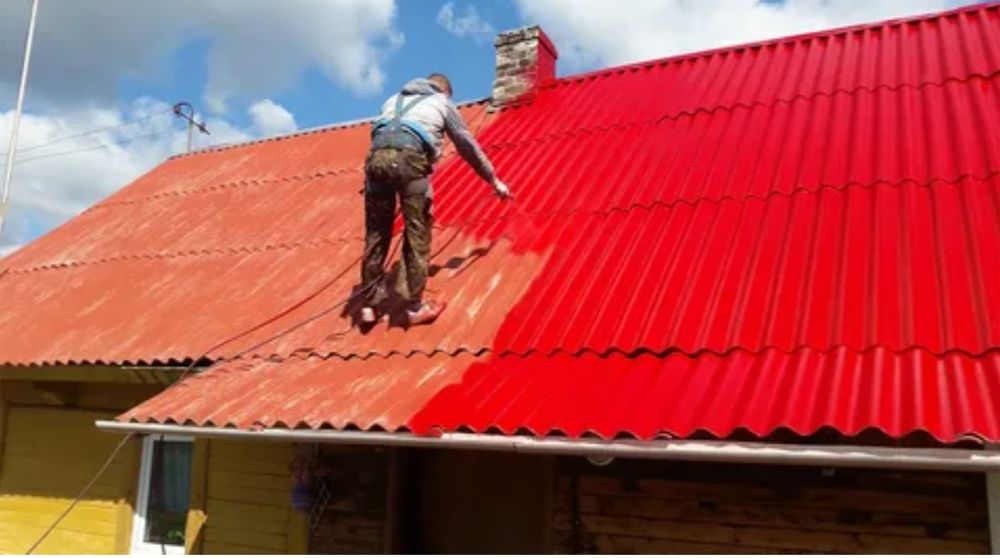 Покраска крыш забора