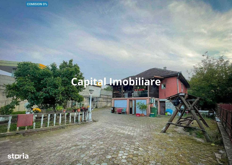 Casa 7 camere, teren 590 mp in Calnic