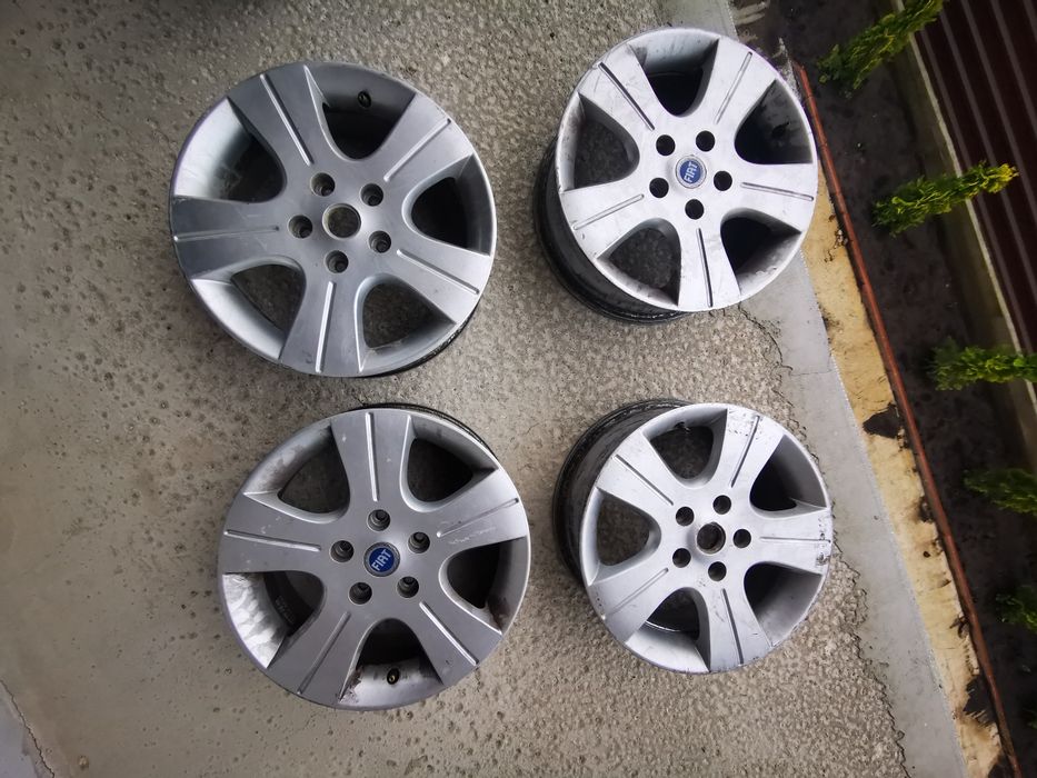 Jante Aliaj Originale Fiat Sedici / Suzuki SX4 - 16 inch - 5x114.3 și Set 4 Anvelope Vară Michelin 205/60 R16