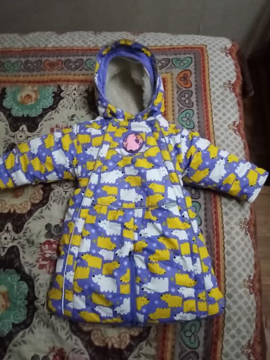 Продам комбинезон и коляску