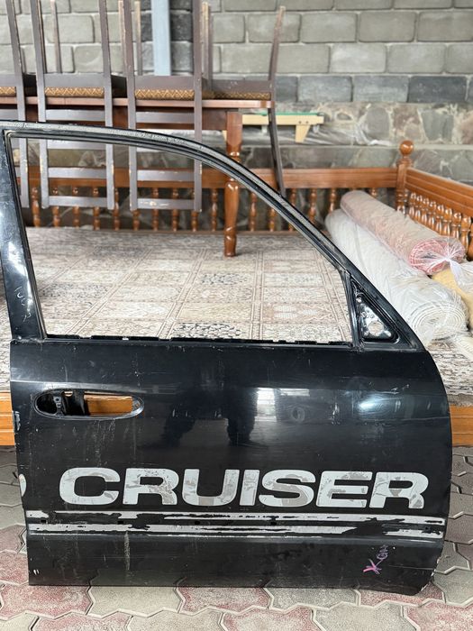 Двери и крыло от крузака 100