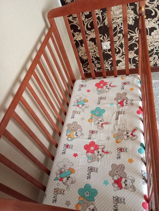 Манеж на колёсиках