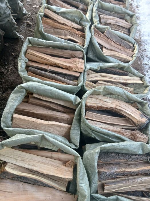 Дрова в мешках. Цена 1500