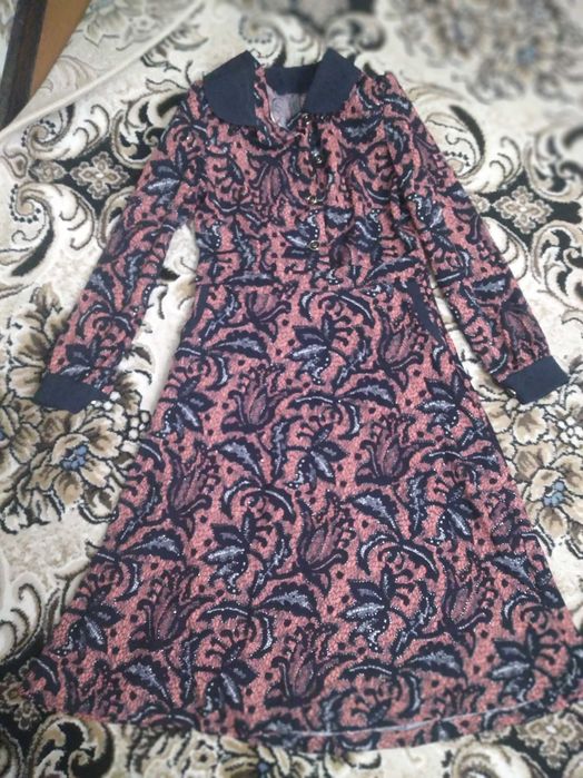 Ko'ylak tikuvchi tikkan yangi kiyilmagan.  narxi 80 ming so'm