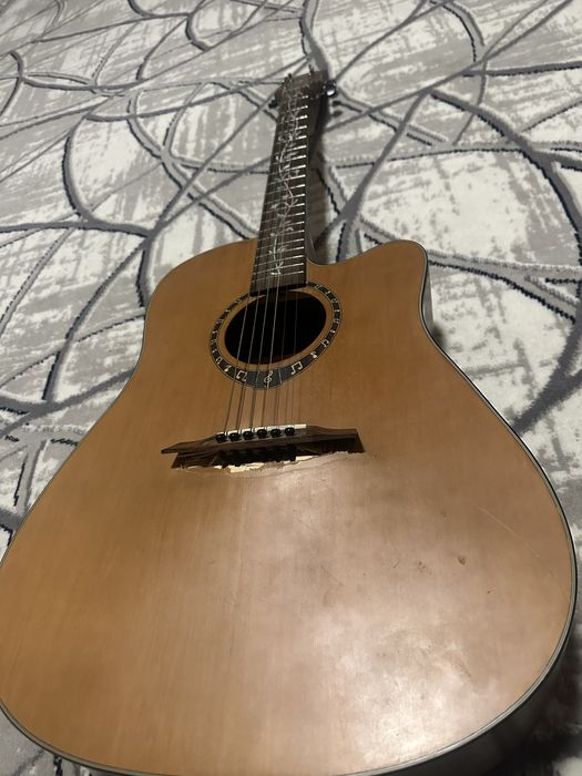 Koreyada ishlab chiqarilgan gitara. Holati o’rta. Sovuqda qolib ketdi