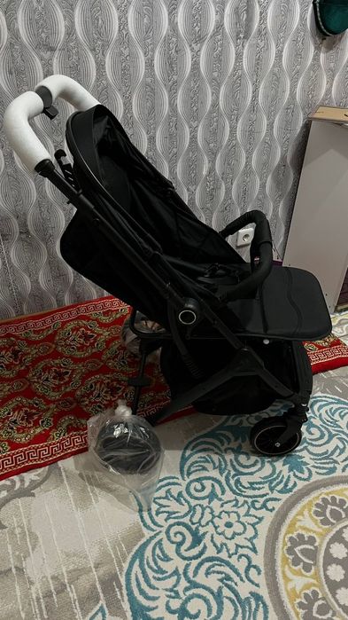 Новый коляска колданылмаган