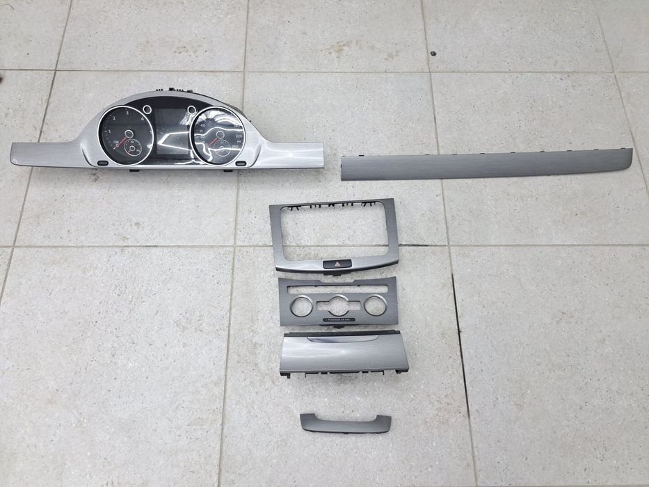 Volan comenzi, spira, trimuri, grile aer,  panou clima, oglinzi passat