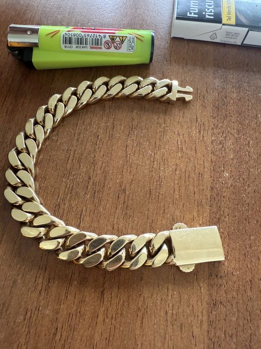 Bratara aur Cuban plina aur masiv 14 karate 100 grame lucrata manual