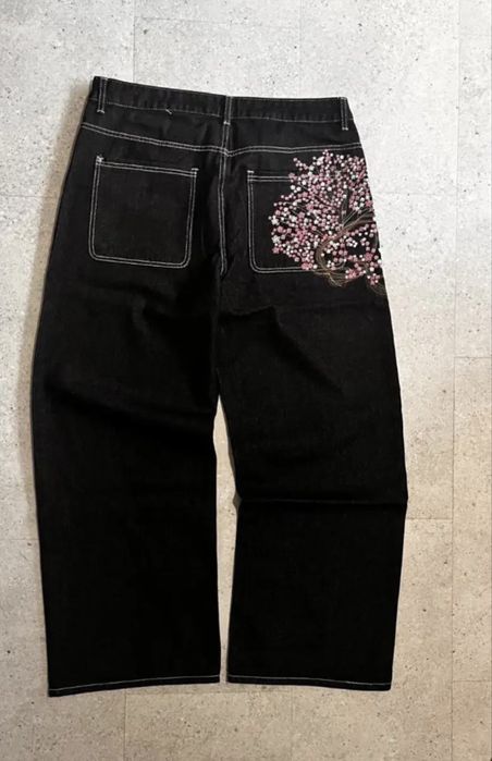 Джинсы с сакурой