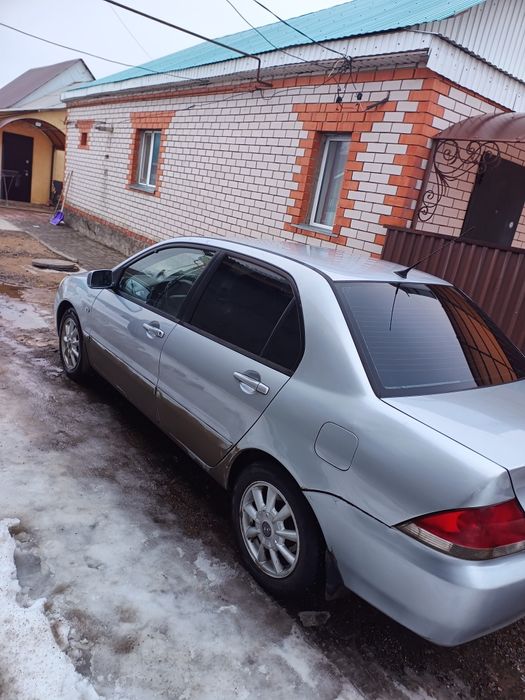 Митсубиси Лансер 2005