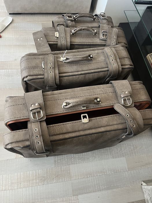 4 броя кожени куфари