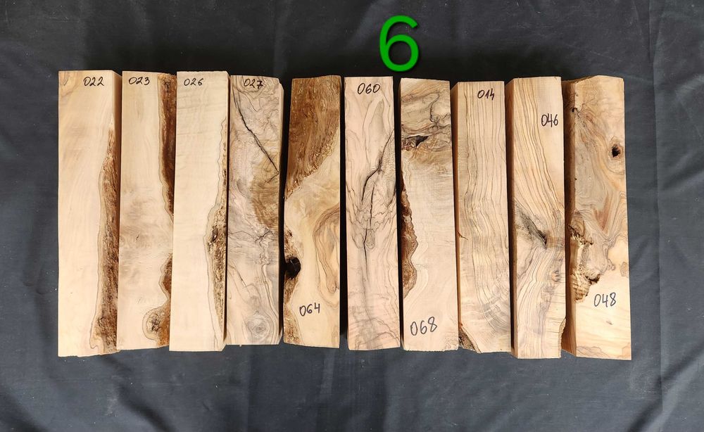 Заготовки (трупчета) от маслиново дърво (дървен материал)