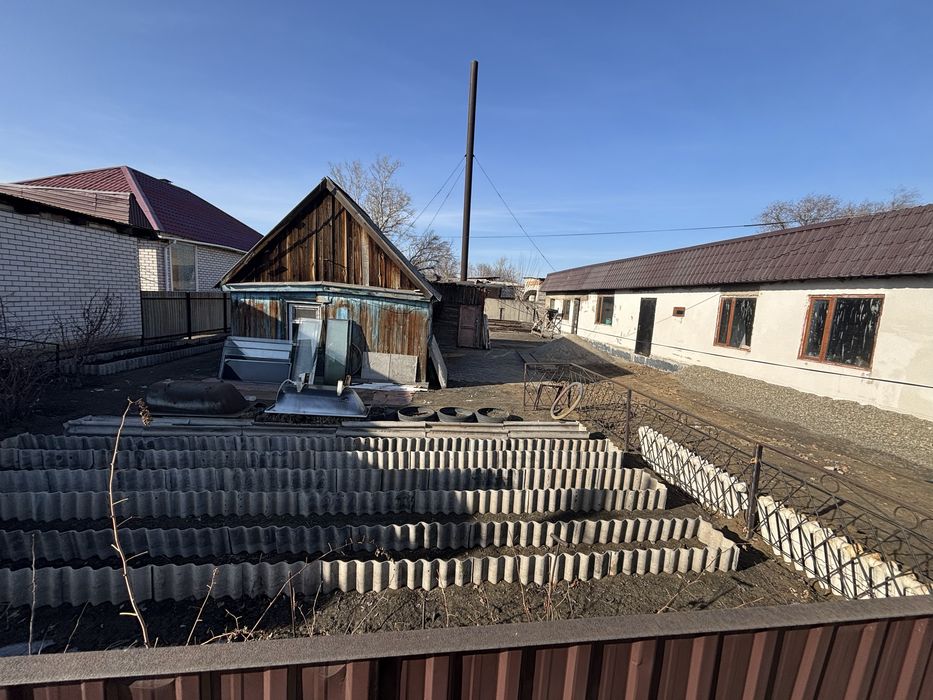 Частный дом с пристройкой