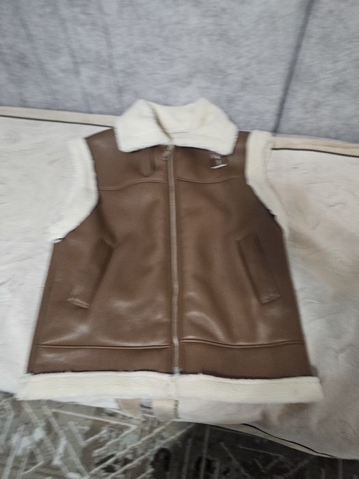 Продам  безрукавку новую