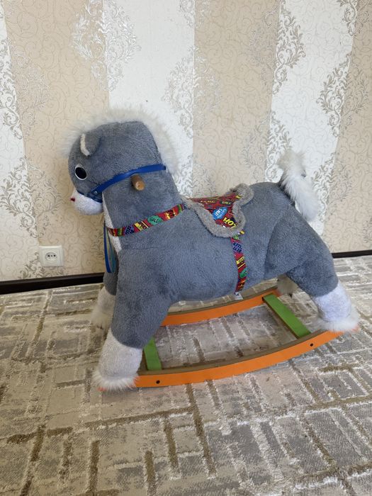 Игрушечная лошадка кочалка