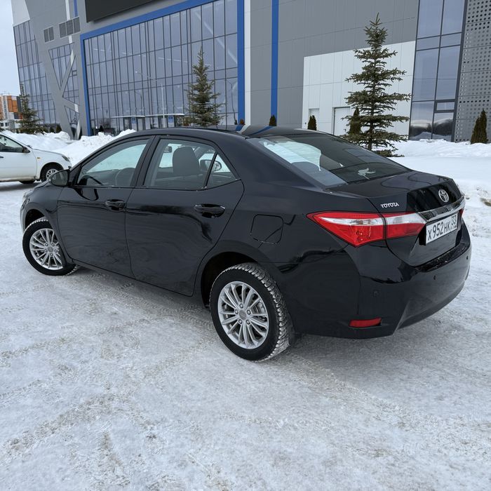Тойота Королла 2014 г