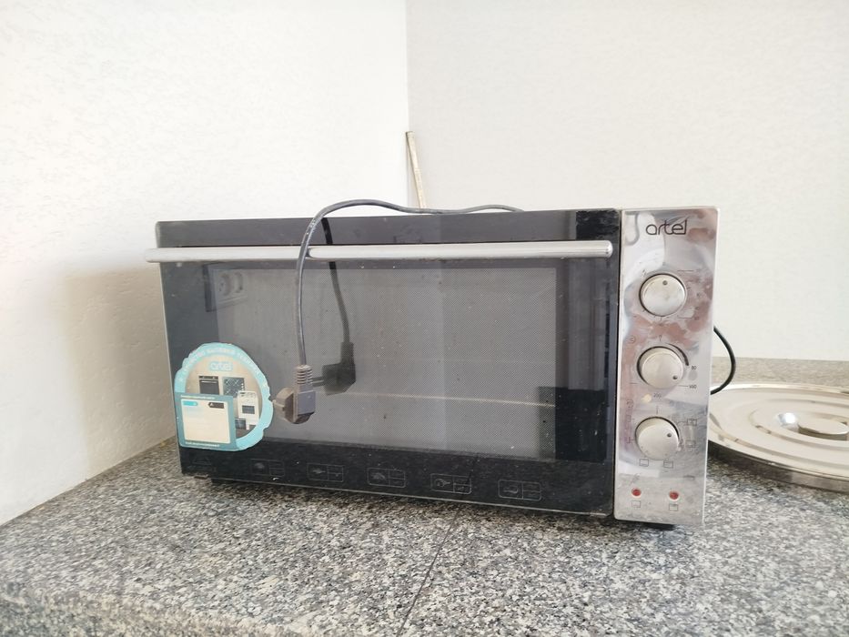 Электрическая духовка Artel