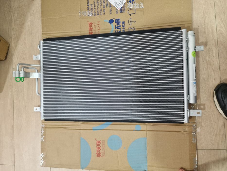 Радиатор охл./конд. Geely Emgrand