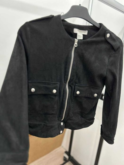 Елегантна връхна дреха