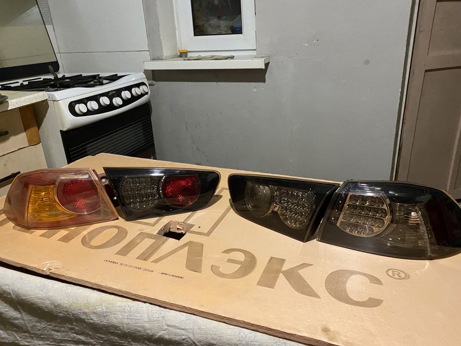 Задний фонарь лансер 10