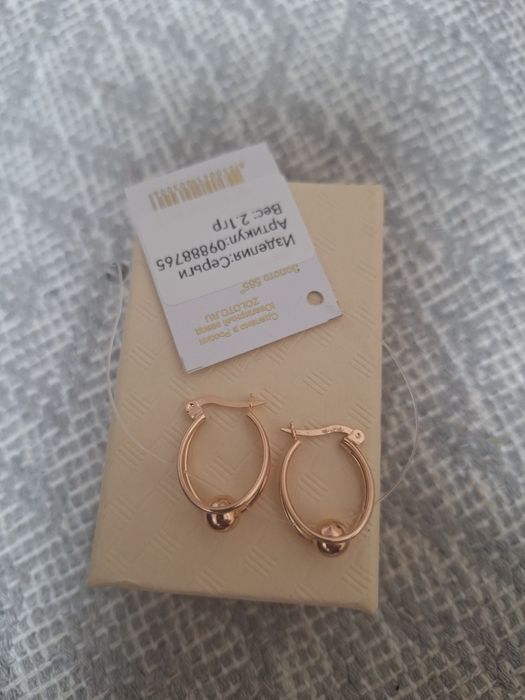 Продам золотои серьги