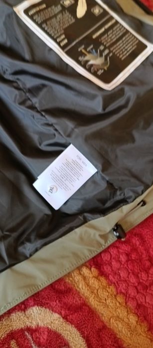 Продам новый пуховик