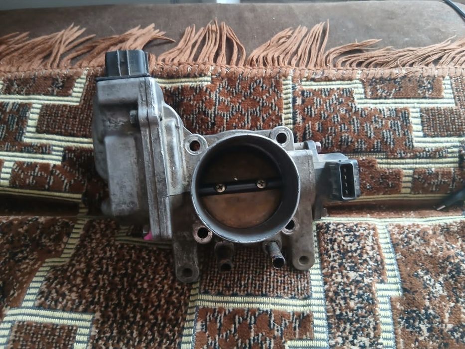 Дроссельная заслонка