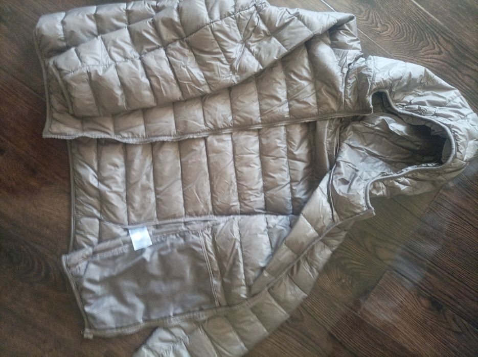 Пуховик женский 52 разм.юникло без дефектов в отличном состоянии