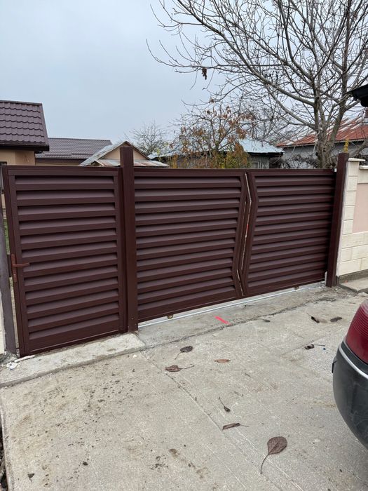 Confectii metalice,Panouri Gard,Porti balamale si  Role,Usi Garaj,balustrade balcon,maini curente scara