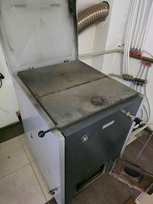 Котел Bosch solid 2000 + пелетна горелка Ferroli и шнек за пелети