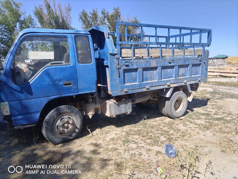 Жүкті өзі түсетін машина