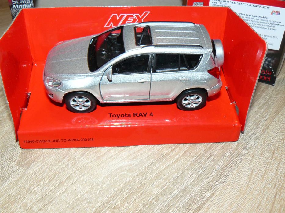 Macheta Auto De Colectie TOYOTA RAV4 MK3 Scara 1:34,Noua WELLY NEX