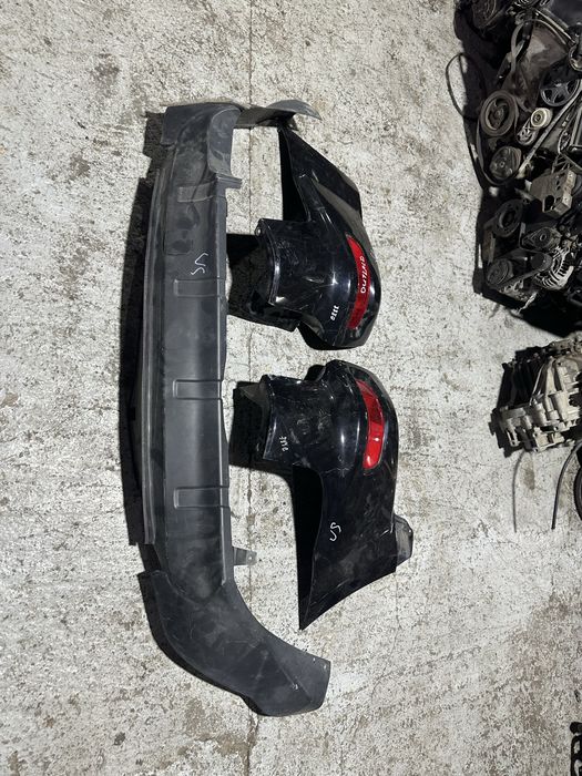 Задний бампер Mitsubishi Outlander XL