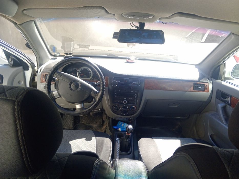 Ласетти 1.8 холати идиал зур яхши иккита жойида Петер бор газ.бензин .