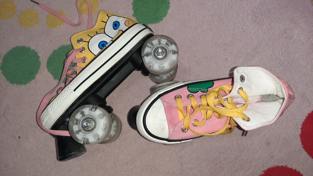 Роликовые коньки