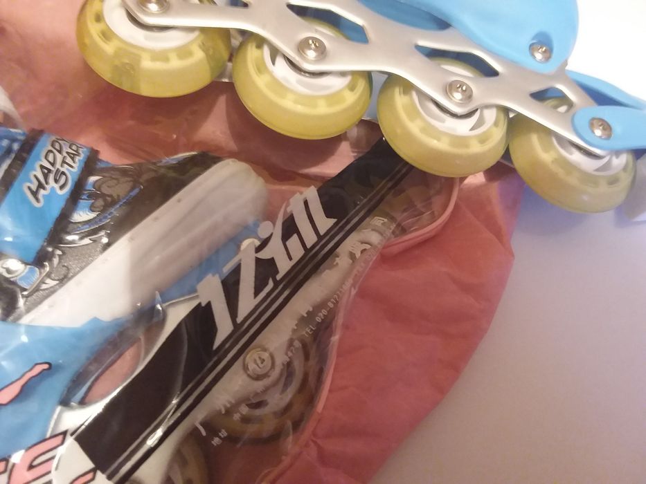 Новые роликовые коньки.