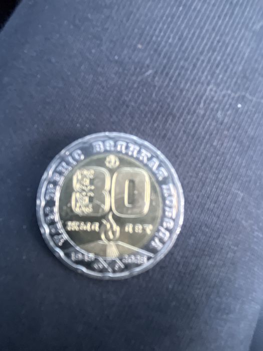 Колекционная монета 200