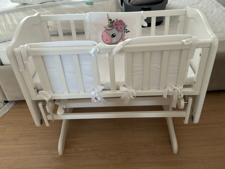 Колыбель с маятником