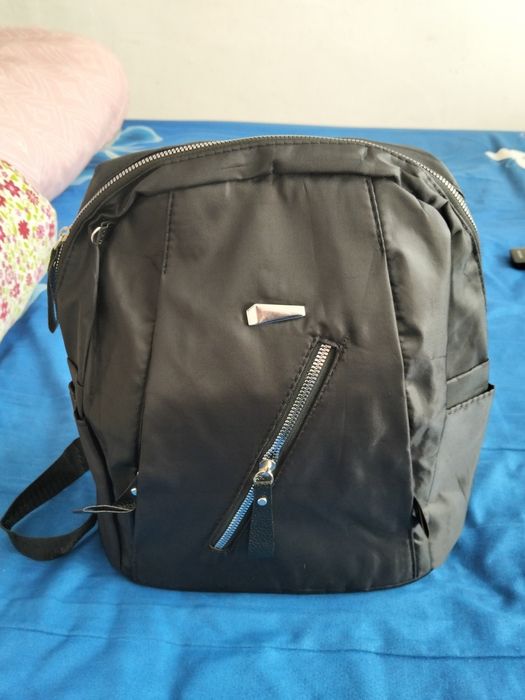 Rucsac încăpător cu buzunare