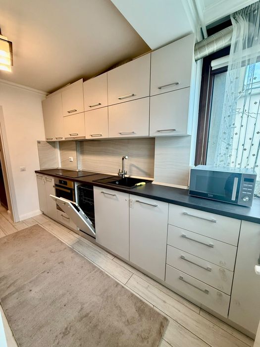 Închiriez apartament cu două camere  mobilat si utilat
