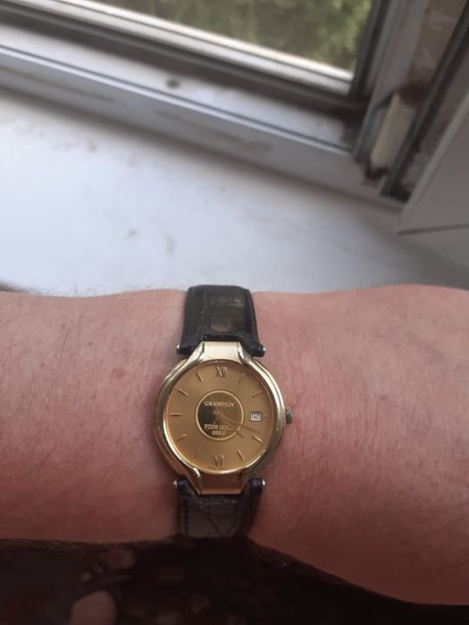 Золотые часы бренда Romanson  GRAND  JOY