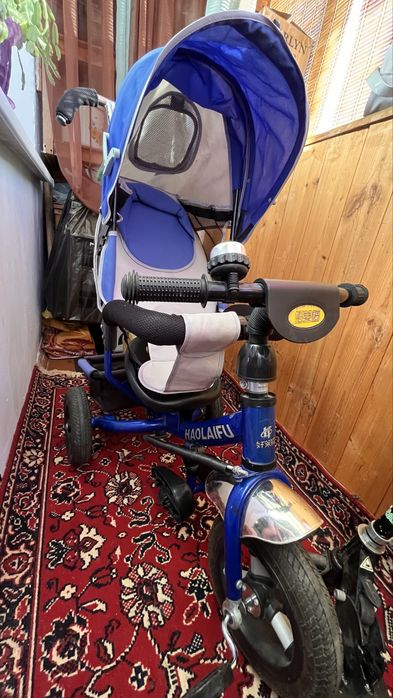 Детский велосипед с ручкой