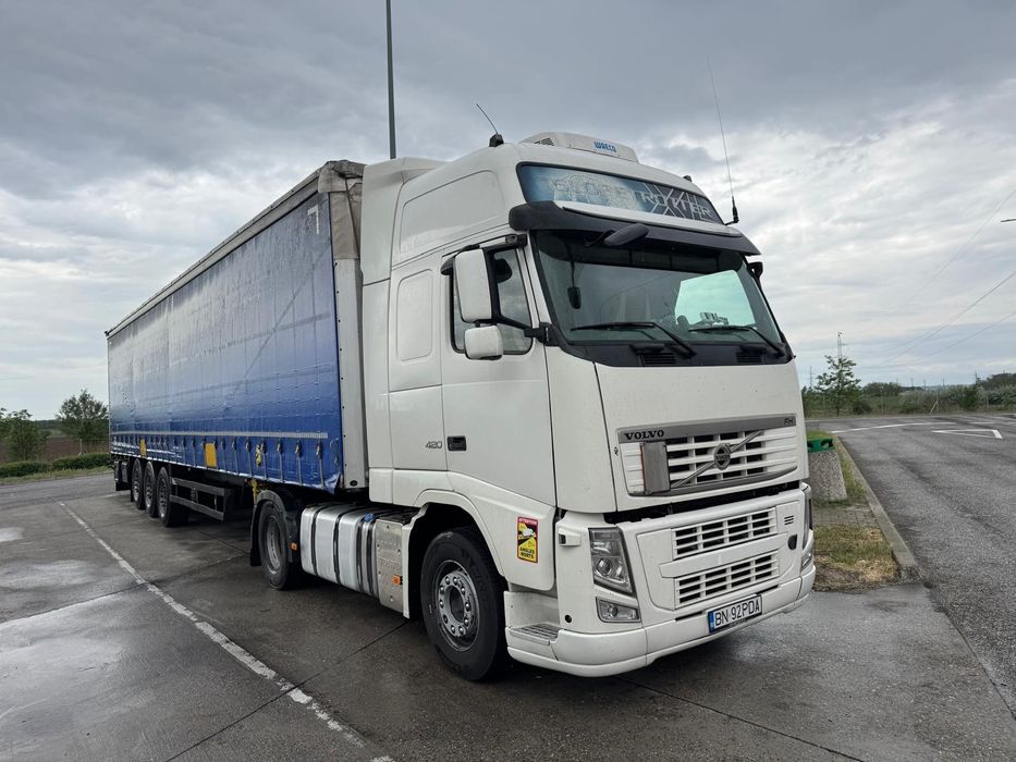 Ansamblu VOLVO 420 2013 și remorca Schmitz 2008