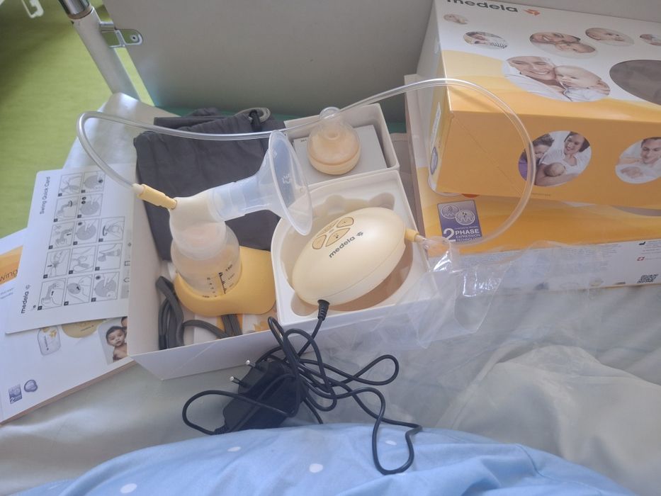 Електрическа помпа за кърма Medela Swing + подаръци