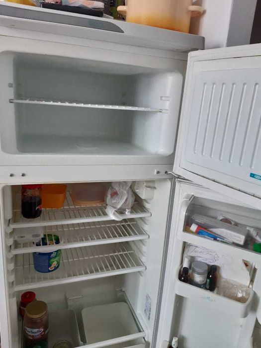 холодильник Стинол  среднего размера