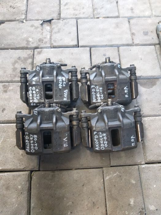 Суппорт передний Honda Accord Одиссей 02-09 цена за 1шт