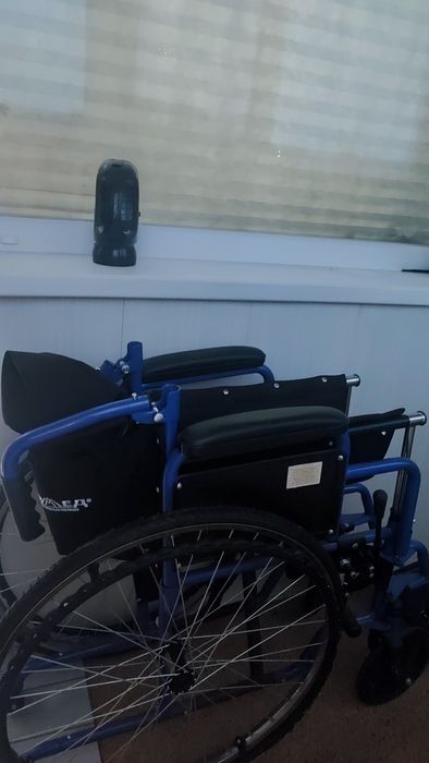 Инвалидное кресло.