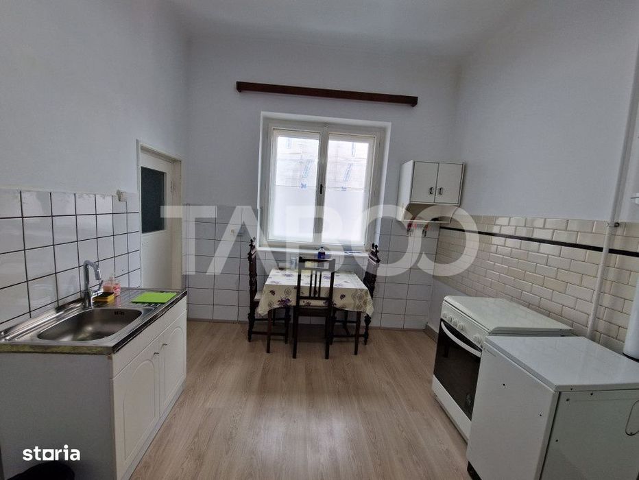 Apartament central 4 camere spatiu comercial garaj si pivnita Sibiu