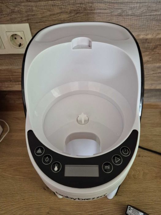 Baby Brezza pro advance машина за мляко